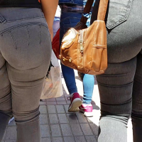 Two sexy asses in grey jeans