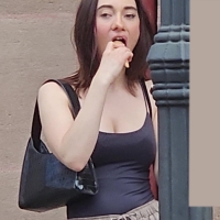 Candid hot girl showing cleavage while eating ice cream hotgirl.mp4-2024-06-16-08h44m29s680.jpg