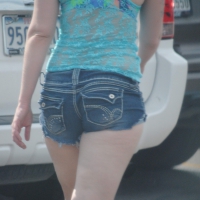 Girl filling her water jugs