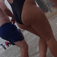 Thick blonde in blue swimsuit