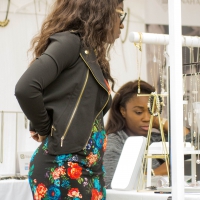 Black chick in floral skirt