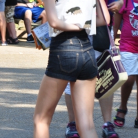 Skinny blonde chick in little denim shorts Skinny babe in shorts