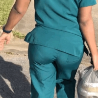 Ebony family friend in green scrubs with a nice ass Ebony friend in scrubs
