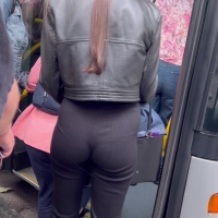 Shaped girl at bus stop