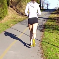 Girl jogging in short spandex shorts