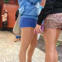 Sexy Latina in stockings and short skirt