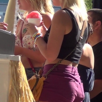 Cheeky blonde in short shorts getting a snowball