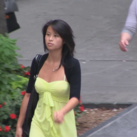 Asian in yellow dress