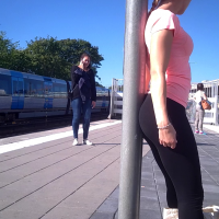 Girl with amazing ass waiting for the train