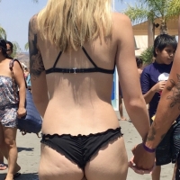 Sexy candid tattooed blonde chick in a black thong bikini tumblr_p7c0diojAw1x18jdvo3_1280.jpg