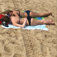 Two sexy ass friends in tiny bikinis laying out at the beach tumblr_pbyzoxGEca1wa0jg2o10_1280.png
