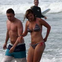 Sexy bikini babe with nice body in the water Bikini babe in the water