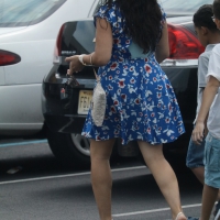 Latina milf in a parking lot in a blue floral dress Latina milf in blue dress