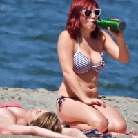 Redhead babe on the beach in blue bikini with nice tits Redhead in blue bikini
