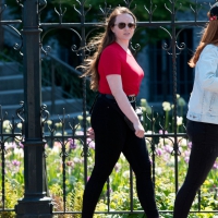 Girl with big boobs walking in black jeans Big boob girl walking