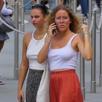 Two hot candid braless chicks with nice tits showing pokies in white tops NotMe-TCZ-2022-2 is better tan 1.mp4-2023-06-27-11h01m41s473.jpg