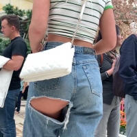 Two hot ass blonde chicks, one in a tiny skirt and the other showing her ass in ripped jeans FireCandids_FlowerGazing.mp4-2021-06-28-14h49m51s576.jpg
