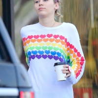 Miley Cyrus out in light blue tights Miley Cyrus in blue tights