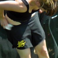 Couple gymnastics girls changing in the open