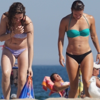 2 cute friends in bikinis on the beach 2 friends in bikinis