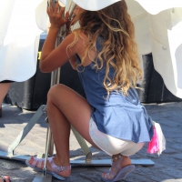 Sexy blonde girl in short white shorts Sexy blonde in white shorts