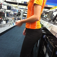 Redhead Dora working at Best Buy in tight pants with a nice ass Redhead Dora with nice ass