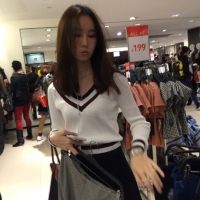 Adorable Asian in short skirt upskirted while shopping Adorable Asian upskirt