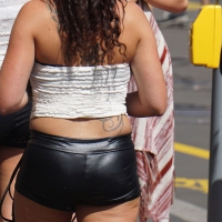 Girl out in tiny little leather shorts with a decent ass Girl in little leather shorts