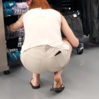 Redhead hottie in shorts shopping with a nice ass Redhead hottie in shorts