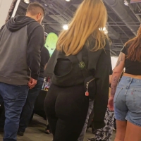 Candid sexy shorts stack blonde with a nice ass in black leggings at a horror expo Shorty with cake.mp4-2024-07-11-15h48m56s572.jpg
