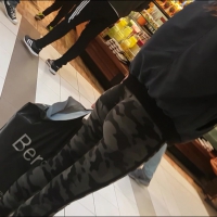 Sexy girl in camo leggings