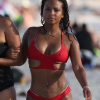 Christina Milian in red bikini in Miami with hard nipples Christina Milian in red bikini