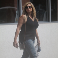 Blonde milf with big boobs and in tight jeans leaving TJ Maxx Blonde milf leaving TJ Maxx