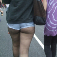Candid cunny brunette in pantyhose and shorts showing her ass cheeks Candid cunny in pantyhose