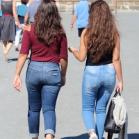Two cute girls walking in tight jeans Two cuties in jeans