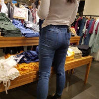 Sexy clothing store employee with a nice ass in tight jeans Sexy employee in tight jeans