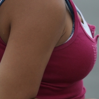 Latina lady with nice boobs in tank top and showing some bra Latina lady with nice boobs