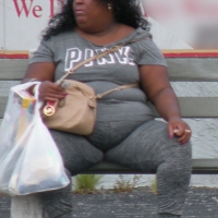 Fat ebony lady in tight grey leggings Fat ebony lady