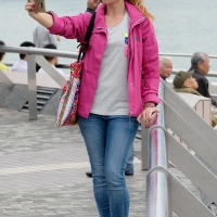 Various candid beautiful women in different outfits in public 98482383@N03_46937158915_Tourist with a Phone 1.jpg
