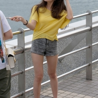 Various candid beautiful women in different outfits in public 98482383@N03_48443204337_Yellow Top, Great Hair 2.jpg