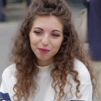Various candid beautiful women in different outfits in public 98482383@N03_48802111071_Curly Hair 1.jpg