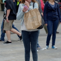 Multiple hot candid babes in tight jeans and pants 98482383@N03_18494353308_Alone in the Crowd 1.jpg