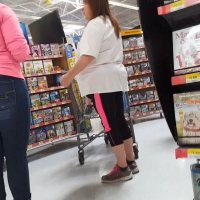 Candid girl in tight jeans and pink sweatshirt with a thick booty 69978319.jpg