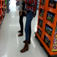 Skinny candid blonde girl in jeans and a plaid shirt 39875721.jpg