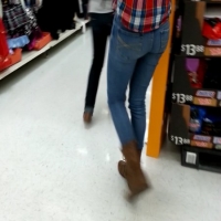 Skinny candid blonde girl in jeans and a plaid shirt 39875727.jpg