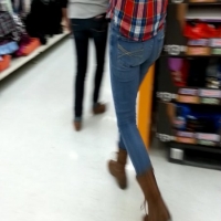 Skinny candid blonde girl in jeans and a plaid shirt 39875725.jpg