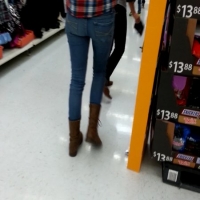 Skinny candid blonde girl in jeans and a plaid shirt 39875728.jpg