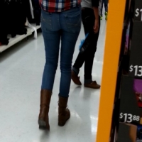 Skinny candid blonde girl in jeans and a plaid shirt 39875731.jpg
