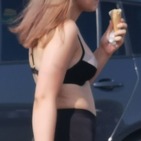 Hot candid girl eating ice cream in spandex shorts and a bra 1626891559823.jpg