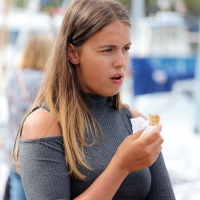 A hot girl eating ice cream Hottie eating ice cream